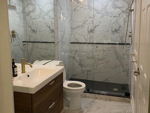 Bathroom renovation with granite soap ledge